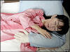 Junko Suzuki demonstrates how she sleeps with a Boyfriend's Arm Pillow. 29/09/04